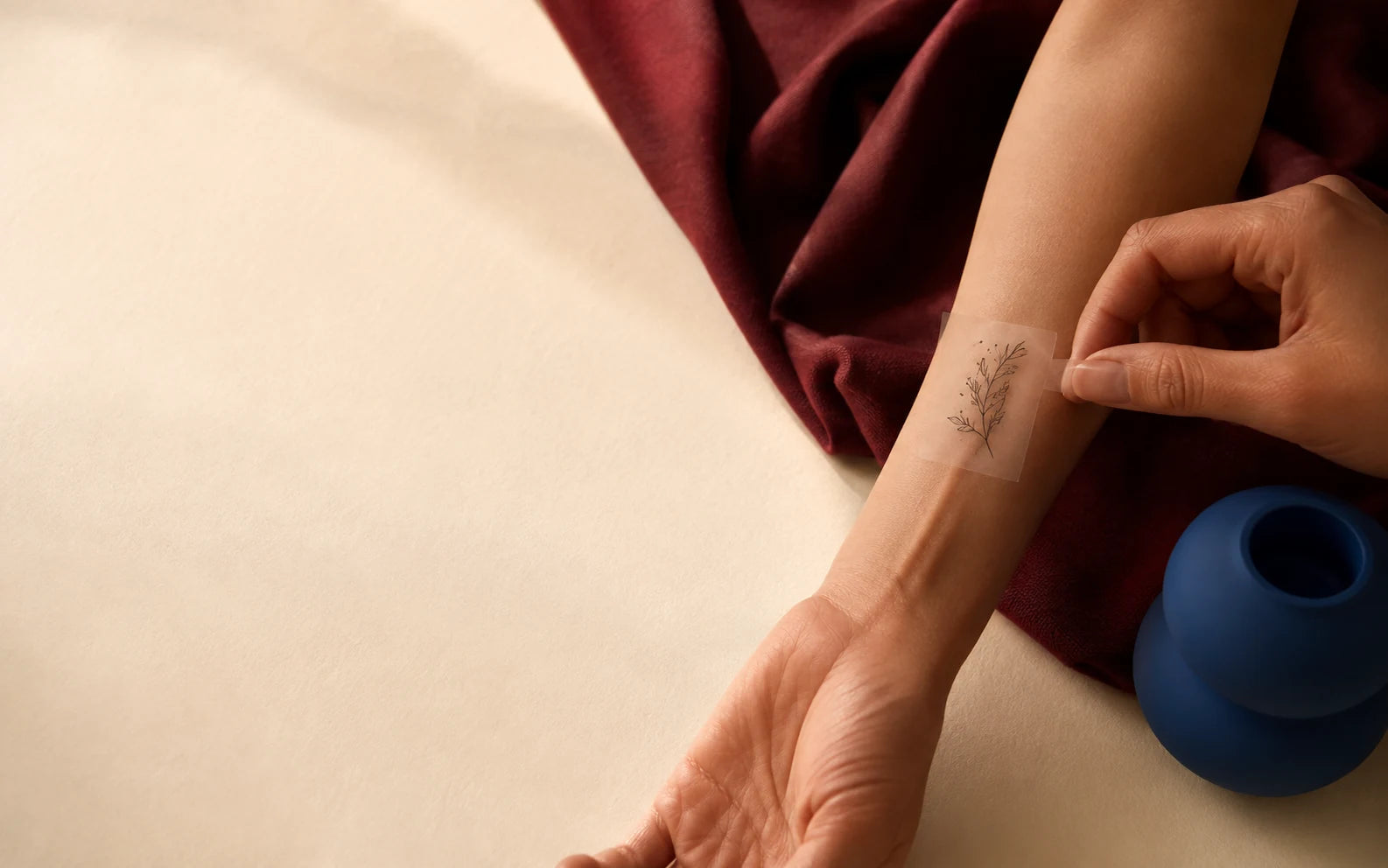 Fine-line temporary tattoos worn on skin